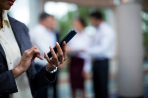 woman using business mobile